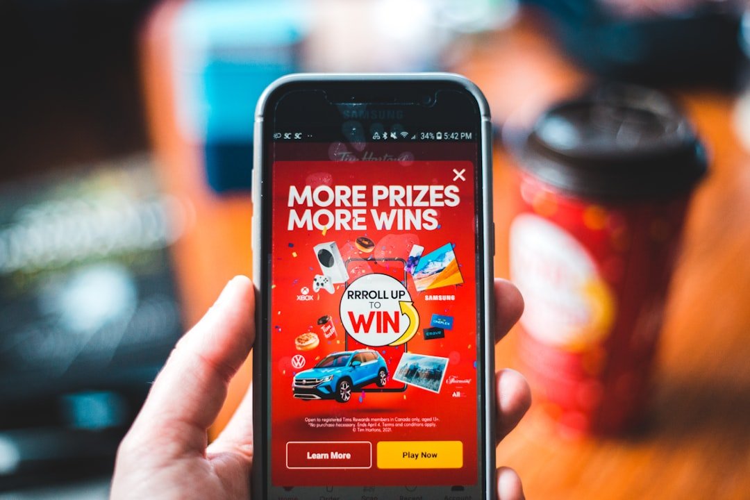 red-and-black-smartphone-showing-game-application-fy-xyswhram